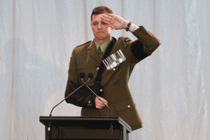 Commanding Officer Major Craig Wilson pays his respects for Luke Tamatea, Jacinda Baker and Richard Harris. Photo / Getty Images