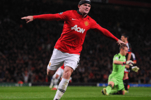 Wayne Rooney reached the 200-goal mark for Manchester United by scoring twice in a 4-2 win over Bayer Leverkusen. Photo / Getty