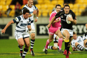 Shaun Treeby breaks towards the try line during Wellington's 38-16 win over Auckland tonight. Photo / Getty