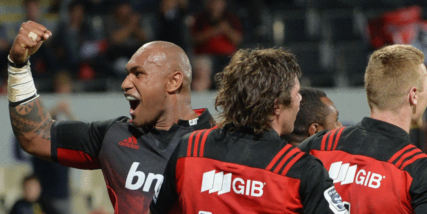 Nemani Nadolo of the Crusaders celebrates with team mates. Photo / Getty Images.
