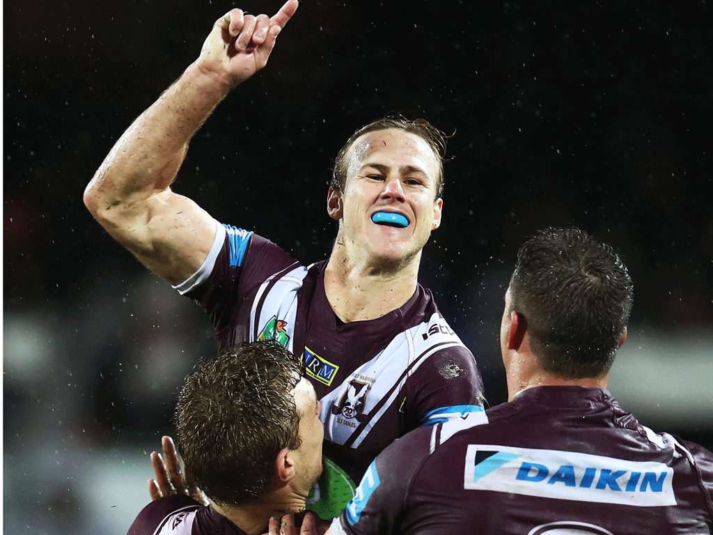 Manly halfback Daly Cherry-Evans celebrates after kicking the match-winning field goal to beat the Warriors in golden point. Photo / Getty Images.