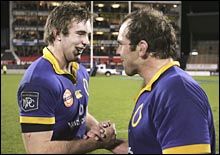 Matt Saunders, left, and Anton Oliver celebrate Otago's win. Ross Land / Getty Images Matt Saunders, left, and Anton Oliver celebrate Otago's win. Ross Land / Getty Images
