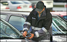 Officer 245 sets a fast pace dishing out tickets, but he will sometimes have mercy. Picture / Brett Phibbs Officer 245 sets a fast pace dishing out tickets, but he will sometimes have mercy. Picture / Brett Phibbs