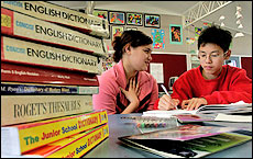 Ora Wahia (left) helps Taiwanese student Patrick with conversational English at the school. Picture / Alan Gibson Ora Wahia (left) helps Taiwanese student Patrick with conversational English at the school. Picture / Alan Gibson