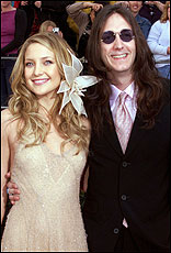 Actress Kate Hudson and husband, musician Chris Robinson. Picture / Reuters Actress Kate Hudson and husband, musician Chris Robinson. Picture / Reuters