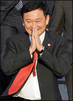 Thaksin on arrival in the UK. Picture / Reuters Thaksin on arrival in the UK. Picture / Reuters