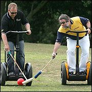 Segway 'Pole Blacks' member Rod Drury (left) steers the ball away from Steve Wozniak. Picture / Brett Phibbs Segway 'Pole Blacks' member Rod Drury (left) steers the ball away from Steve Wozniak. Picture / Brett Phibbs