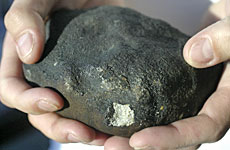 A meteorite is the suspect because the Russian space junk plunged to Earth right on schedule, 12 hours after the jet flew by. Photo / Richard Robinson A meteorite is the suspect because the Russian space junk plunged to Earth right on schedule, 12 hours after the jet flew by. Photo / Richard Robinson