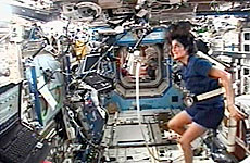 Flight engineer Sunita Williams warms up for her marathon on the International Space Shuttle. Picture / Reuters Flight engineer Sunita Williams warms up for her marathon on the International Space Shuttle. Picture / Reuters