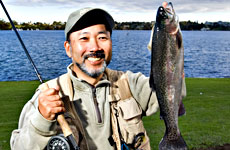 John Shiota's rainbow trout weighed only 900g, but that was enough to win him the prize at lake Pupuke John Shiota's rainbow trout weighed only 900g, but that was enough to win him the prize at lake Pupuke
