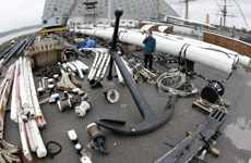 Masts, anchors and other original parts from the Cutty Sark were removed to storage in Kent before renovation work began. Photo / Reuters Masts, anchors and other original parts from the Cutty Sark were removed to storage in Kent before renovation work began. Photo / Reuters