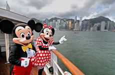 Mickey Mouse and Minnie Mouse pose on a ferry at Hong Kong's Victoria Harbour Mickey Mouse and Minnie Mouse pose on a ferry at Hong Kong's Victoria Harbour