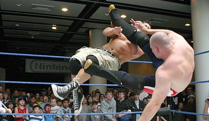 'Ex-Patriot' Alfred Valentine drops 'The One' Vinny Dunn with a spinning heel kick. Photo / Troy Rawhiti-Forbes 'Ex-Patriot' Alfred Valentine drops 'The One' Vinny Dunn with a spinning heel kick. Photo / Troy Rawhiti-Forbes
