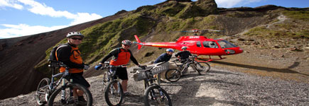 Mountain bikers at the summit of Mt Tarawera. Photo / Graeme Murray Mountain bikers at the summit of Mt Tarawera. Photo / Graeme Murray