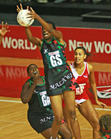 Malawi's Linda Magombo wins possession during the quarterfinal against England. Photo / Getty Images Malawi's Linda Magombo wins possession during the quarterfinal against England. Photo / Getty Images