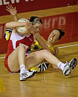 England goal shoot Louisa Brown field (L) and Australian goal keep Liz Ellis collide during their semifinal in Auckland. Photo / Kenny Rodger England goal shoot Louisa Brown field (L) and Australian goal keep Liz Ellis collide during their semifinal in Auckland. Photo / Kenny Rodger