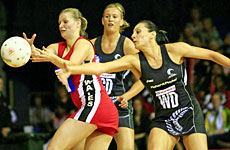 Wales' Rebecca James (L) and Joline Henry (R) fight for possession during their game at the Netball World Championships. Photo / Martin Sykes Wales' Rebecca James (L) and Joline Henry (R) fight for possession during their game at the Netball World Championships. Photo / Martin Sykes