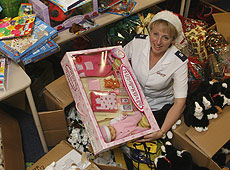 Caryn Daly of the Salvation Army with donated gifts. Photo / Glenn Jeffrey Caryn Daly of the Salvation Army with donated gifts. Photo / Glenn Jeffrey