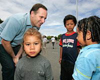 John Key talks to children at McGehan Close. Photo / Chris Skelton John Key talks to children at McGehan Close. Photo / Chris Skelton