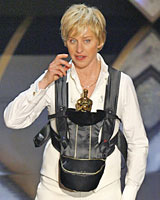 Show host Ellen DeGeneres holds an Oscar in a baby sling during the awards ceremony. Photo / Reuters Show host Ellen DeGeneres holds an Oscar in a baby sling during the awards ceremony. Photo / Reuters