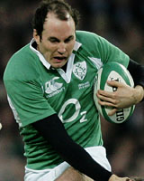 Girvan Dempsey on the way to one of Ireland’s four tries. Photo / Getty Images Girvan Dempsey on the way to one of Ireland’s four tries. Photo / Getty Images