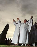 Modern-day Druids celebrate an eclipse. Photo / Reuters Modern-day Druids celebrate an eclipse. Photo / Reuters
