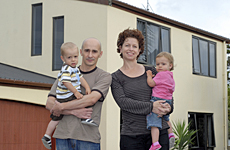 Suze and Stephane Foucher, with their twins Leo and Maya, say their house is leak-free. Photo / Michael Craig Suze and Stephane Foucher, with their twins Leo and Maya, say their house is leak-free. Photo / Michael Craig