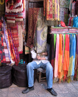 Unlike this guy, most stall holders in Marrakesh are eager to sell you their wares. Photo / Michael Harvey Unlike this guy, most stall holders in Marrakesh are eager to sell you their wares. Photo / Michael Harvey