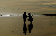 A father crouching down to speak to his son. Photo / Herald on Sunday A father crouching down to speak to his son. Photo / Herald on Sunday