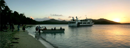 Passengers return to their ship in a longboat after a lovo (Fijian hangi). Photo / Bay of Plenty Times Passengers return to their ship in a longboat after a lovo (Fijian hangi). Photo / Bay of Plenty Times