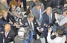 Winston Peters cuts a swathe through a waiting group of media representatives. Photo / Mark Mitchell Winston Peters cuts a swathe through a waiting group of media representatives. Photo / Mark Mitchell