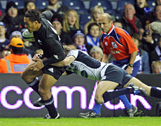 Anthony Tuitavake goes in for the All Blacks' opening try against Scotland at Murrayfield this morning. Photo / AP Anthony Tuitavake goes in for the All Blacks' opening try against Scotland at Murrayfield this morning. Photo / AP