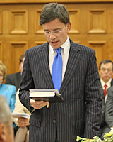 The new Attorney General, Chris Finlayson, reading the oath of office during the swearing-in ceremony. Photo / Mark Mitchell The new Attorney General, Chris Finlayson, reading the oath of office during the swearing-in ceremony. Photo / Mark Mitchell