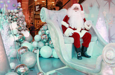 A Santa waits to see children at a mall in Sydney. Photo / Getty Images A Santa waits to see children at a mall in Sydney. Photo / Getty Images