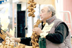 A garlic seller pitches hard. Photo / Supplied A garlic seller pitches hard. Photo / Supplied