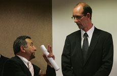 Joe Karam speaks to David Bain as he stands in the dock at Christchurch High Court on Friday. Pool photo Joe Karam speaks to David Bain as he stands in the dock at Christchurch High Court on Friday. Pool photo