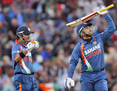 Century-maker Virendar Sehwag (right) celebrates with partner Gautam Gambhir. Photo / Sarah Ivey Century-maker Virendar Sehwag (right) celebrates with partner Gautam Gambhir. Photo / Sarah Ivey