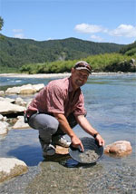 Goldminer Mark Allen sells jewellery made from the gold he's struck along the Buller River. Photo / Jim Eagles Goldminer Mark Allen sells jewellery made from the gold he's struck along the Buller River. Photo / Jim Eagles