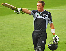 Martin Guptill salutes the crowd after scoring a century on debut for New Zealand. Photo / Getty Images Martin Guptill salutes the crowd after scoring a century on debut for New Zealand. Photo / Getty Images