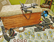 Firearms found in the bedroom where Jan Molenaar was found dead. Photo / NZ Police Firearms found in the bedroom where Jan Molenaar was found dead. Photo / NZ Police