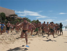 Dave Handley gets off to a flying start in the Beach to Bar race with the hopes of winning the prize - a bar tab. Photo / Phil Taylor Dave Handley gets off to a flying start in the Beach to Bar race with the hopes of winning the prize - a bar tab. Photo / Phil Taylor