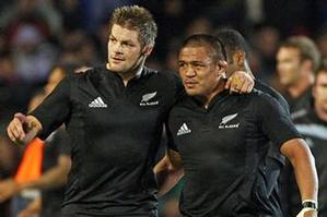 Richie McCaw and Keven Mealamu of the All Blacks walk off after winning the Tri Nations match against Australia. Photo / Getty Images