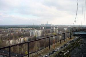 A view across the apartment blocks of Pripyat to Chernobyl in the distance. Photo / Wikimedia Commons image