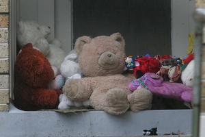 Toys outside the Rotorua house where Trent Matthews died. Photo / Alan Gibson