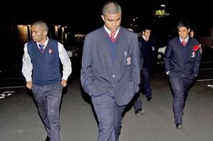 Members of the Kelston Boys 1st XV leave Eden Park after the rugby union hearing. Photo / Dean Purcell