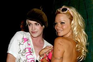 Pamela Anderson and Richie Rich in Auckland last night. Photo / Getty Images