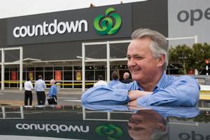 Peter Smith unveiled the new Countdown colour scheme and logo at Westgate Mall yesterday. Photo / Paul Estcourt