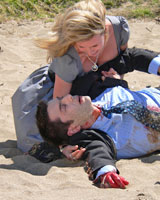 Ethan Pierce (played by Owen Black) dies in the arms of Brooke Freeman (played by Beth Allen). Photo / Supplied Ethan Pierce (played by Owen Black) dies in the arms of Brooke Freeman (played by Beth Allen). Photo / Supplied