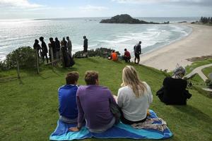 The Mount attracted its share of people keen to glimpse a tidal wave. Photo / Alan Gibson