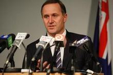 John Key announces the new system during yesterday's press conference. Photo / Mark Mitchell John Key announces the new system during yesterday's press conference. Photo / Mark Mitchell